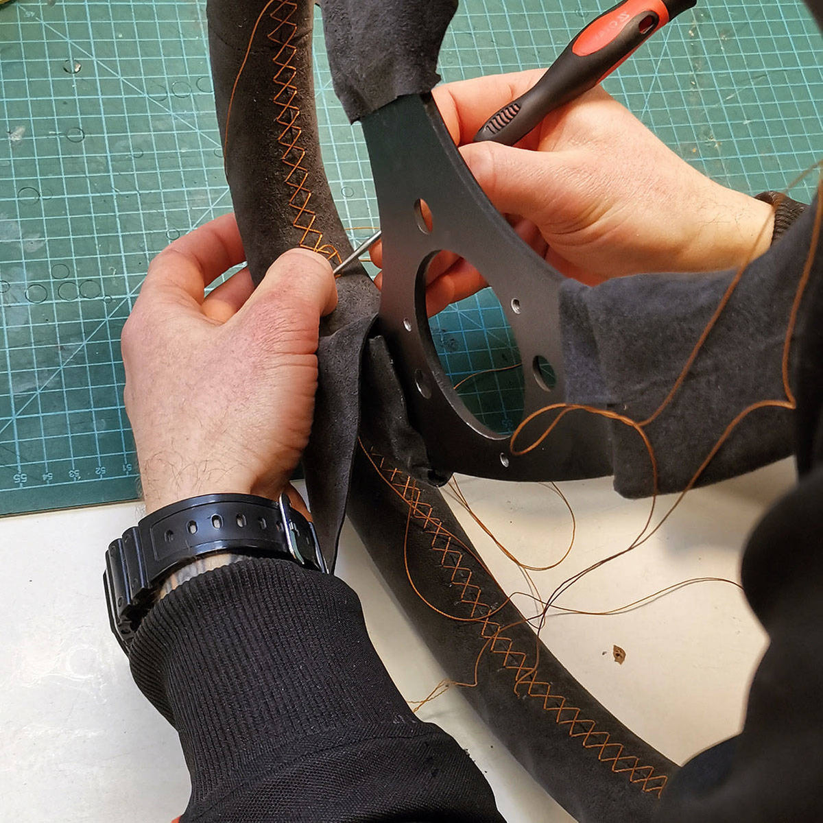 Steering wheel reupholstery / rewrapping service - Basting / Custom / Leather / Yes