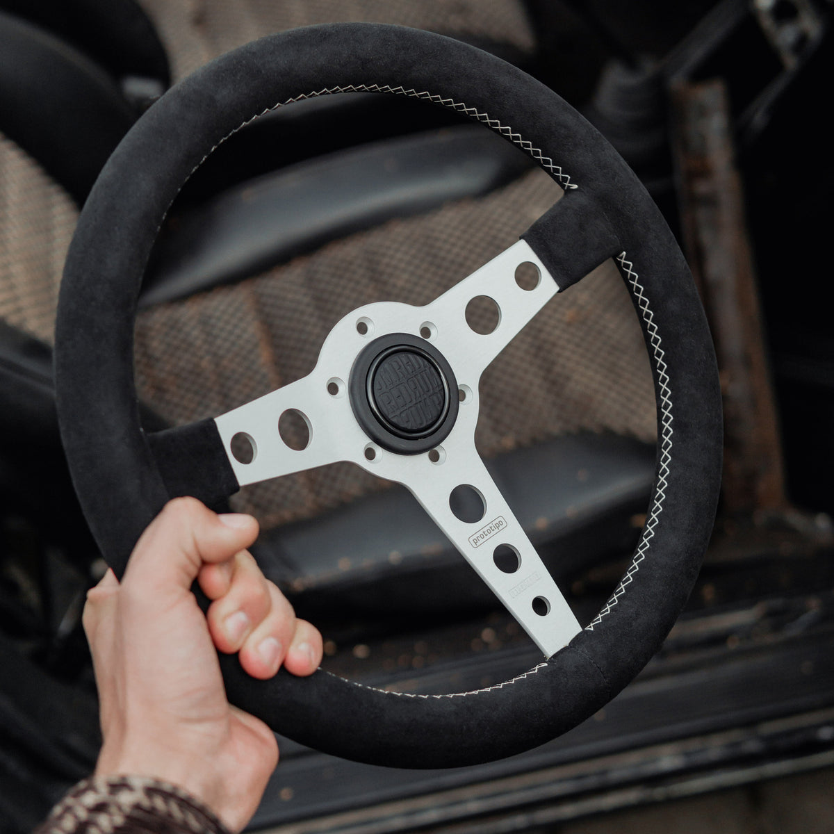 Steering wheel reupholstery / rewrapping service - Cross / Black / Alcantara / Yes