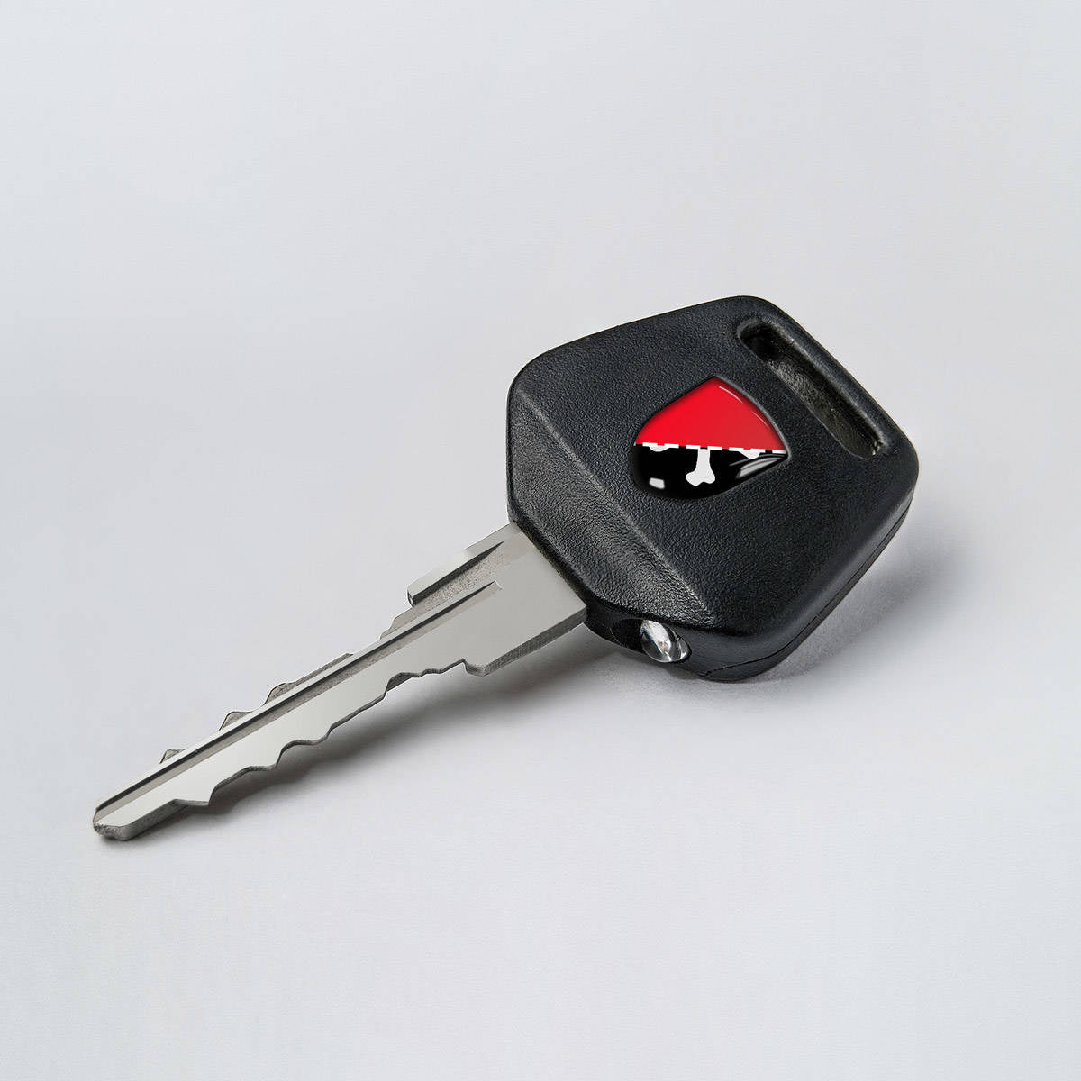 Key emblem - White