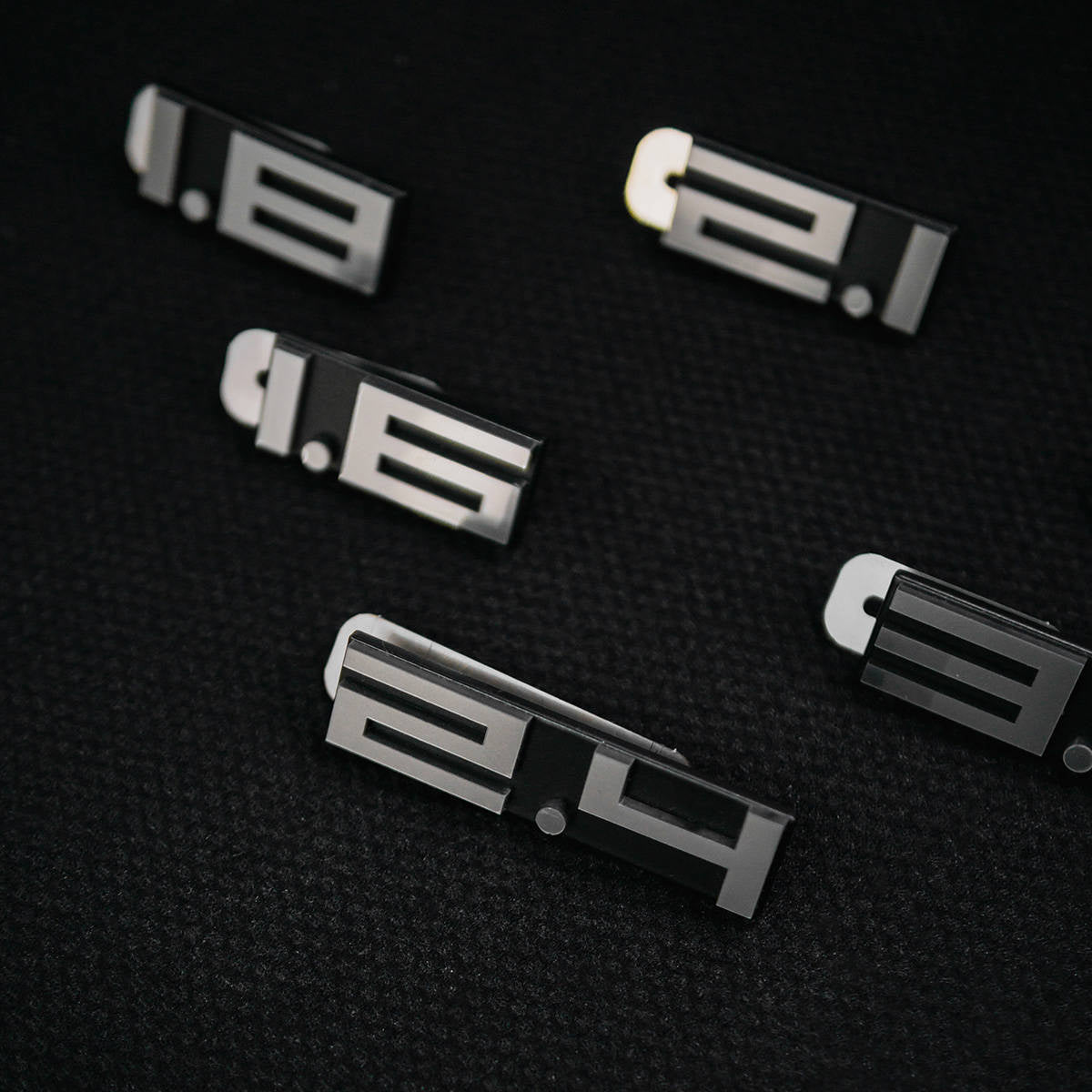 Rear deck lid grille displacement badge/emblem