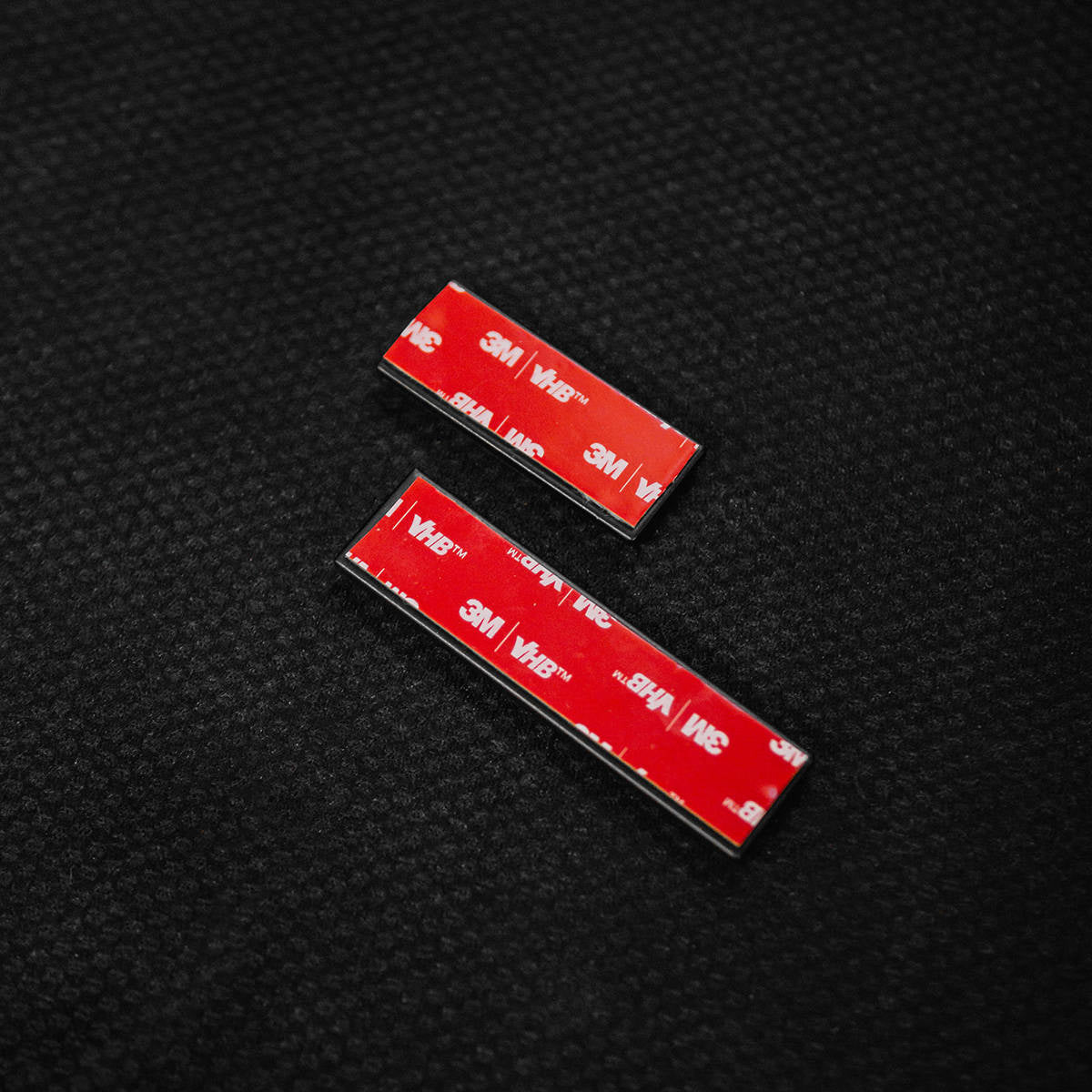 Rear deck lid grille displacement badge/emblem